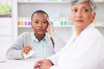 Image showing Consultation, pharmacy and a black woman with a headache and a doctor for healthcare advice. Support, pharmacist and an African patient at a clinic with a migraine and medical worker for help