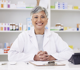 Image showing Pharmacy, happy and portrait of consulting woman for medicine, service or emergency healthcare. Smile, doctor and a mature female pharmacist in a career as a pills distribution consultant at a clinic