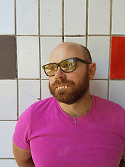 Image showing Bald man in eyeglasses with ugly teeth