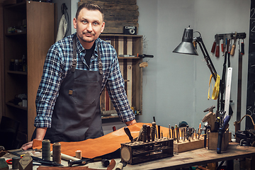 Image showing Concept of handmade craft production of leather goods.