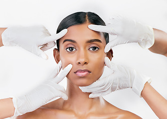 Image showing Hands, face and woman, beauty and plastic surgery, inspection and skincare isolated on white background. Portrait, dermatology and doctor check, female model and procedure with collagen and cosmetics