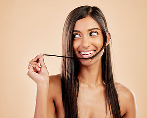 Image showing Hair, beauty and smile, Indian woman with keratin treatment and shine isolated on studio background. Female model, cosmetics and haircare with salon hairstyle, skin and natural glow with dermatology