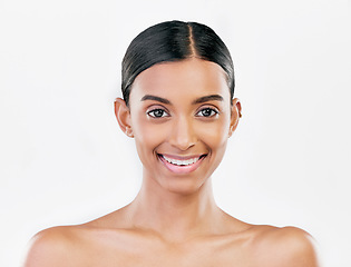 Image showing Beauty, face and portrait a happy woman with natural skin care isolated on a white background. Dermatology, makeup glow and cosmetics with Indian female model for facial shine and self love in studio