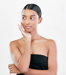 Image showing Beauty, thinking and face of a woman with natural skin care isolated on a white background. Dermatology, makeup glow and cosmetics with Indian female model for facial shine and self love in studio