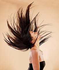 Image showing Woman, hair in air and beauty with cosmetics, keratin treatment and shine isolated on studio background. Female model profile, wind and haircare with cosmetology, Brazilian and texture with growth