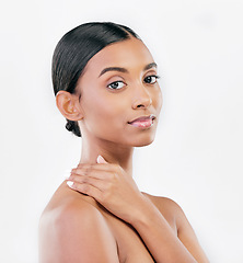 Image showing Touch, beauty and face portrait of a woman with natural skin glow isolated on a white background. Dermatology, makeup and cosmetics of Indian female model for facial shine or self care in studio