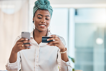 Image showing Work, online shopping and a black woman with a credit card and phone for ecommerce or banking. Happy, finance and an African girl or employee making a payment on a mobile app from the office