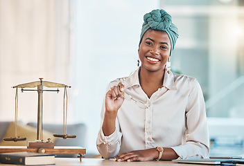 Image showing Lawyer, portrait and happy black woman with glasses in office, law firm or workplace table. African attorney, face and smile of professional, employee or worker with legal advisor career in Nigeria.