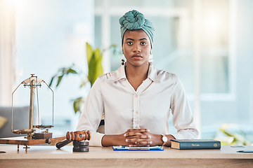 Image showing Lawyer, portrait and serious black woman on table in office, law firm or workplace. African attorney, face and confident professional, employee or worker on desk for legal advisor career in Nigeria.