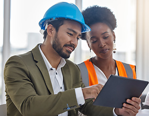 Image showing Tablet, collaboration or planning with a construction worker and architect meeting in an office for a building project strategy. Technology, teamwork and a designer man talking to a woman colleague