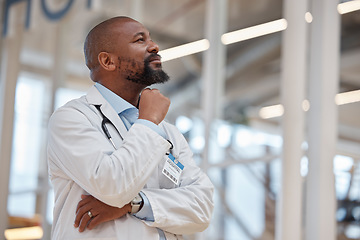 Image showing Thinking, hospital doctor and black man planning medical project, healthcare inspiration or brainstorming clinic innovation. Medicine idea, surgeon plan and African person question cardiology service