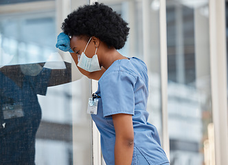 Image showing Surgeon, mental health problem and black woman sad after surgery fail, hospital error or clinic crisis. Depression, burnout and African female doctor tired after medical mistake, stress or healthcare