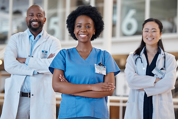 Image showing Happy black woman, portrait and team of doctors in healthcare, hospital management or trust. Diversity group, medical employees and smile with arms crossed in collaboration, clinic or surgery support