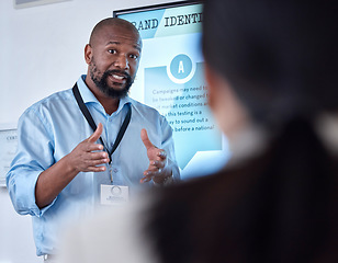 Image showing Corporate, black man and leader with presentation, workshop and discussion with brand development. Male person, presenter and ceo with a vision, training and mentor with communication and education