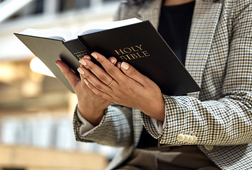 Image showing Hands, bible and person with reading, religion and faith with knowledge, learning and studying God. Priest, book and focus for spiritual wisdom, information and mindset for Christianity with peace