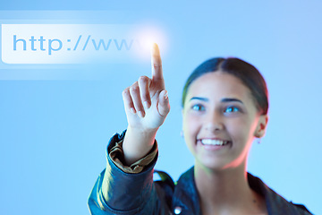 Image showing Hologram, futuristic and woman typing, link and connection against a blue studio background. Female person, employee or holographic with data analytics, cloud computing or programming with url or web