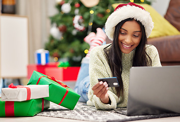 Image showing Christmas, e commerce and woman with laptop, credit card for online payment for gift with internet banking. Female customer, smile for holiday donation or shopping for present, fintech and bank app