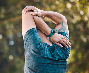 Image showing Arm stretching, outdoor and man in a park with sport injury and muscle pain from fitness and workout. Exercise physio, body of person and back with medical, health and problem from training accident