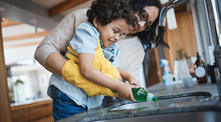 Image showing Washing, dishes and mother with child in kitchen for learning housework, teaching and helping with chores. Housekeeping, happy family and mom and boy with soap for cleaning, hygiene and development