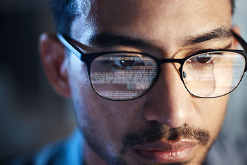 Image showing Glasses, man and reflection of code on computer working on software, programming and data. IT, engineer and serious face of developer with information technology for cyber security in office closeup