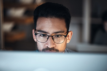 Image showing Computer, research and man in glasses for software development, night programming and cybersecurity. Reading, focus and person or programmer with data analysis, desktop system and coding information