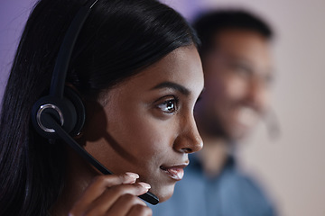 Image showing Woman, call center and headphones at night in customer service, support or telemarketing at the office. Face of serious female person, consultant or agent with headset for online advice or assistance