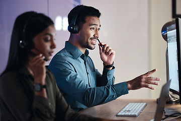 Image showing Man, call center and headphones at night in customer service, support or telemarketing at the office. Happy male person, consultant or agent with headset on computer in online advice at the workplace