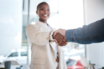 Image showing Black woman, handshake and meeting in partnership, support or trust for teamwork or unity at office. African female person or employee shaking hands for introduction, agreement or deal at workplace