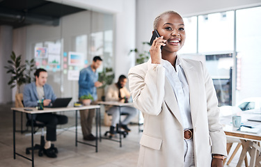 Image showing Phone call, happy and black woman in office for communication, conversation or chat. Smartphone, smile and African business professional listen, talk or discussion with contact in coworking workplace