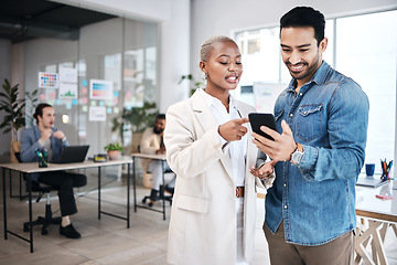 Image showing Office phone, diversity teamwork and happy people review online media application, creative design or research project. Smartphone, communication smile and professional team reading app sales success