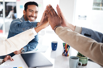 Image showing Creative people, meeting and high five for team building, success or achievement at the office. Happy group with hands together for teamwork, celebration or support in trust or startup at workplace