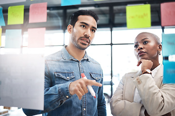 Image showing Creative people, team and thinking in schedule planning, brainstorming or meeting at the office. Man and woman in wonder, decision or teamwork for project plan, tasks or sticky note ideas in startup