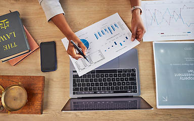 Image showing Documents, data analysis and person hands for legal statistics, crime report and charts or graphs above. Laptop, paperwork and infographics of lawyer, people or attorney hands for social media policy