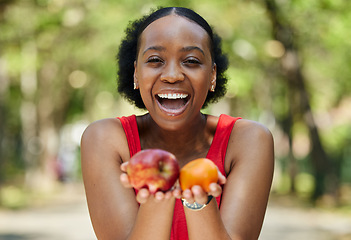 Image showing Apple, orange and portrait of a black woman with a fruit on a farm with fresh produce in summer and smile for wellness. Citrus, nutrition and young female person on an organic diet for self care