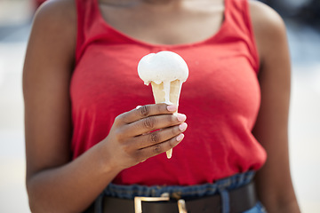 Image showing Hands, woman and vanilla ice cream for dessert, cool snack and sweet food outdoor in city street, vacation or travel. Closeup, female person and eating frozen cone, melting gelato and dripping summer