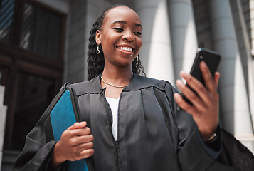 Image showing Judge, court or lawyer with phone to contact a client, communication or legal services and advice on mobile app online. Smile, black woman and smartphone for research, information or consulting law