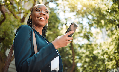 Image showing Outdoor, black woman and smartphone with connection, typing and happiness with social media, nature and travel. Thinking, female person or girl with a cellphone, mobile app or smile with website info