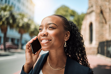 Image showing Happy black woman, phone call and city in travel, conversation or communication outdoors. African female person smile for business discussion, networking or work trip on smartphone in an urban street