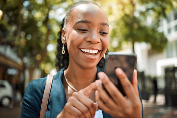 Image showing Outdoor, black woman and smartphone with a mobile app typing and happiness with social media, contact and email. Thinking, female person or girl with a cellphone, connection or website info in a city