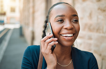 Image showing Happy black woman, phone call and walking in city for conversation or communication outdoors. African female person smile for business discussion, networking or travel on smartphone in an urban town