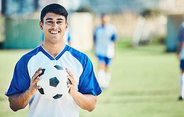 Image showing Football player, portrait and man on field for training, fitness and workout goals, competition and exercise. Happy soccer athlete or face of young person with sports mindset, game and outdoor health