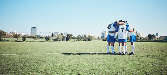 Image showing Sports, mockup and a team of soccer players in a huddle on a field for motivation before a game. Football, fitness and training with man friends getting ready for competition on a pitch together