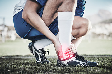 Image showing Injury, sports and hand of a man on foot pain, soccer emergency and accident while training. Fitness, problem and an athlete or football player with inflammation or a swollen muscle on the field