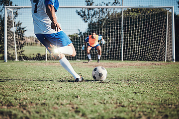 Image showing Fitness, penalty and soccer player scoring a goal at training, game or match at a tournament. Sports, exercise and back of male football athlete kick ball at practice on outdoor field at stadium.