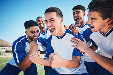 Image showing Winner, goal and soccer with team and happiness, men play game with sports and celebration on field. Energy, action and competition, male athlete group and football player cheers with success outdoor