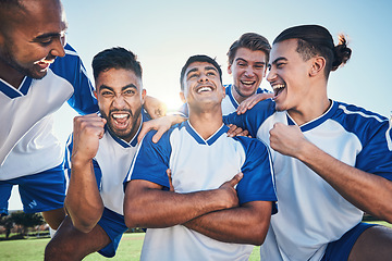 Image showing Win, football player and men celebrate together on a field for sports and fitness achievement. Happy male soccer team or athlete group with fist for challenge, competition or pride outdoor on pitch