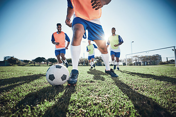 Image showing Football, men and exercise with action, field and wellness with workout goal, fitness and competition. Male players, guys and athlete with a challenge, soccer and sports with energy and training