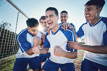 Image showing Winning, goal and soccer player with team and happiness, men play game with sports and celebration on field. Energy, action and competition with male athlete group, cheers and diversity with success