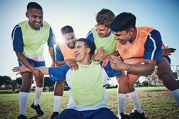 Image showing Football team, game and men celebrate together on a field for sports and fitness win. Happy male soccer player or athlete group for challenge, training or performance achievement outdoor on pitch