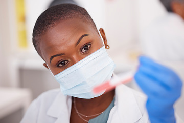 Image showing Black woman, face and mask for blood test, science and innovation in vaccine, research or working with virus dna sample. Tube, container and hand of scientist or medical expert with biotechnology